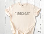 No Human Is Illegal on Stolen Land Tee – Retro Activist Shirt