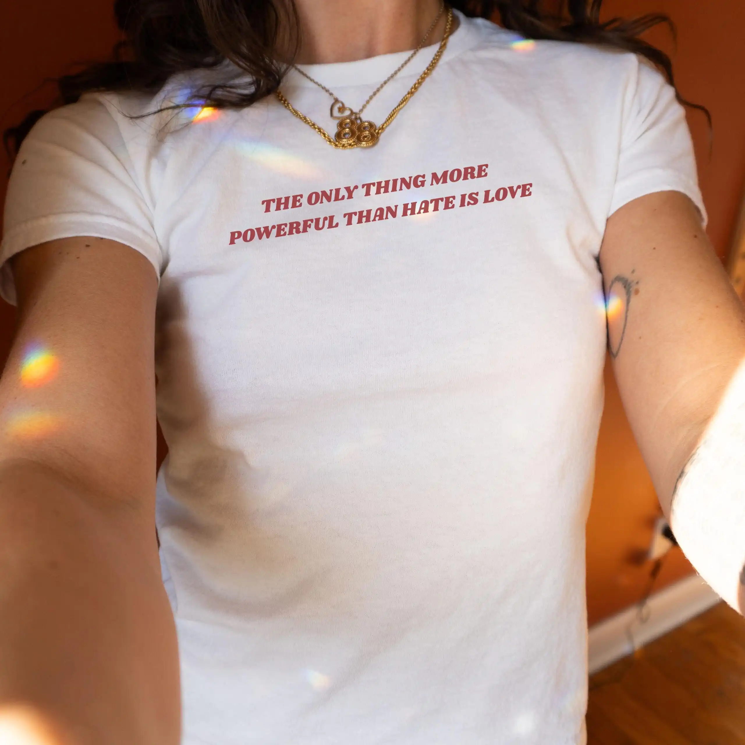 The Only Thing More Powerful Than Hate Is Love Baby Tee - Social Justice Shirt The Only Thing More Powerful Than Hate Is Love Baby Tee - Social Justice Shirt