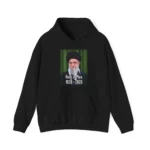 Black hoodie with small centered portrait graphic and text “Rest in Pss 1939–2026.