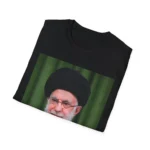 Folded black t-shirt showing a portrait graphic; only the top of the design is visible.