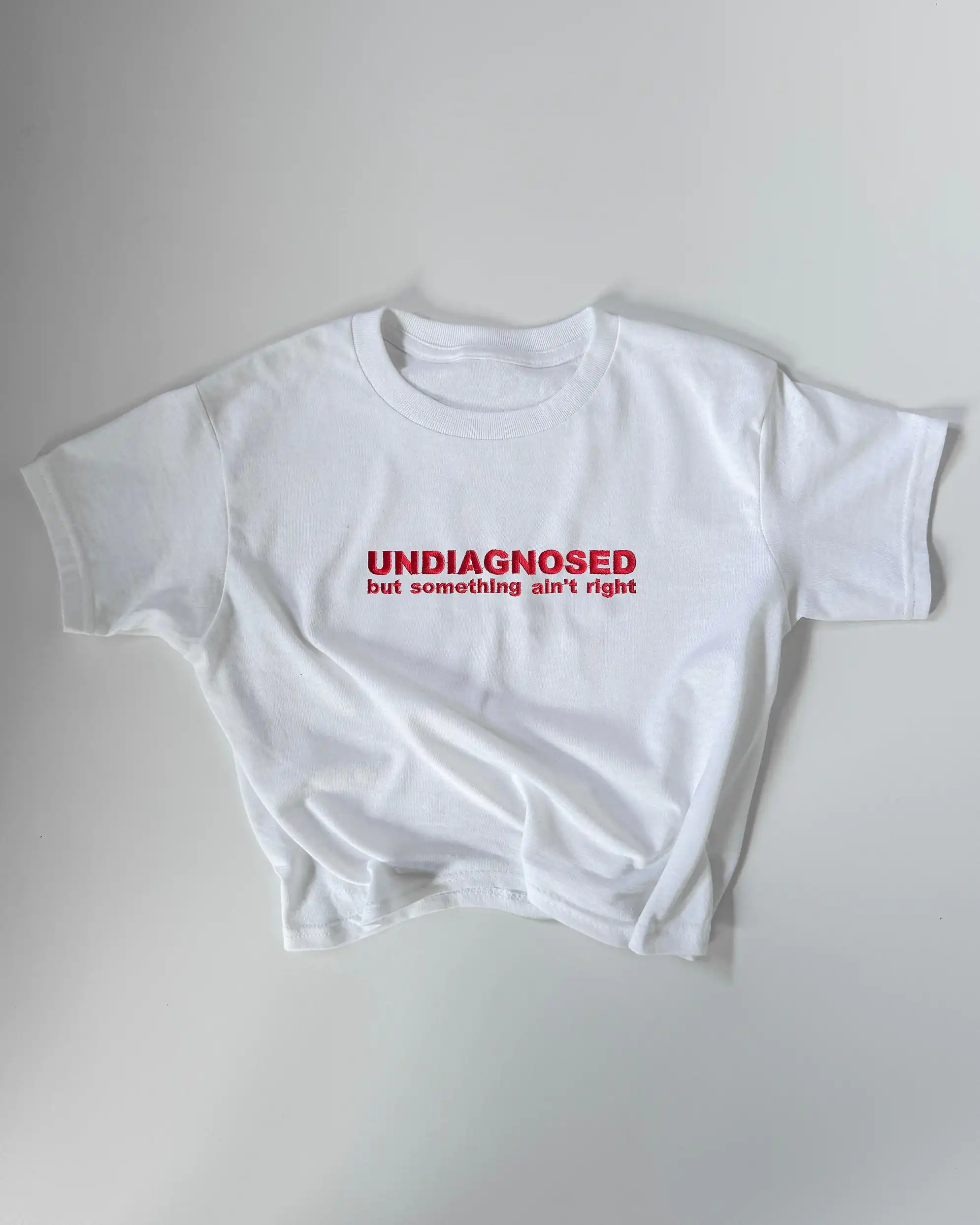 Undiagnosed But Something Ain’t Right 90s Y2K T-Shirt - Baby & Classic Fit Undiagnosed But Something Ain’t Right 90s Y2K T-Shirt - Baby & Classic Fit